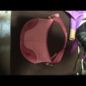 Pink coach purse leather on the bottom