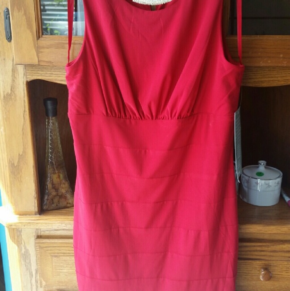 Red sheath dress with necklace