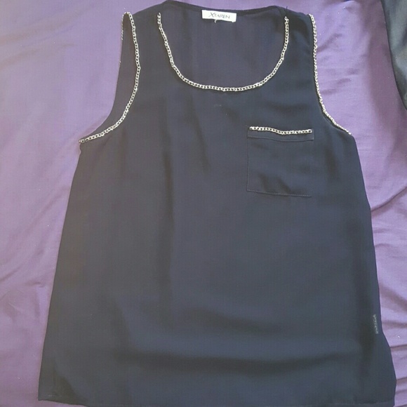Black top with golden chain lining