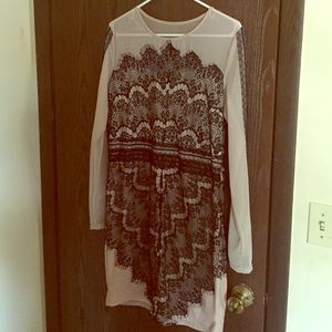 Can use as a long shirt or short dress