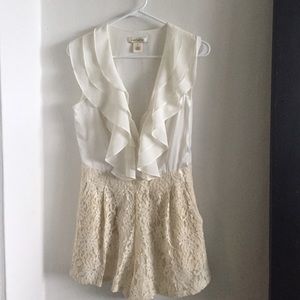 Cream and white romper size medium!