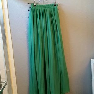 Green pleated skirt