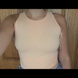 Peachy colored crop top