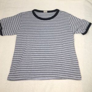 Blue top with black and white stripes