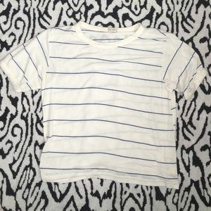White top with blue stripes