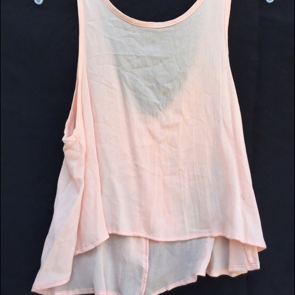 Light pink crop top with bow in the back