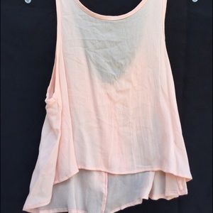 Light pink crop top with bow in the back
