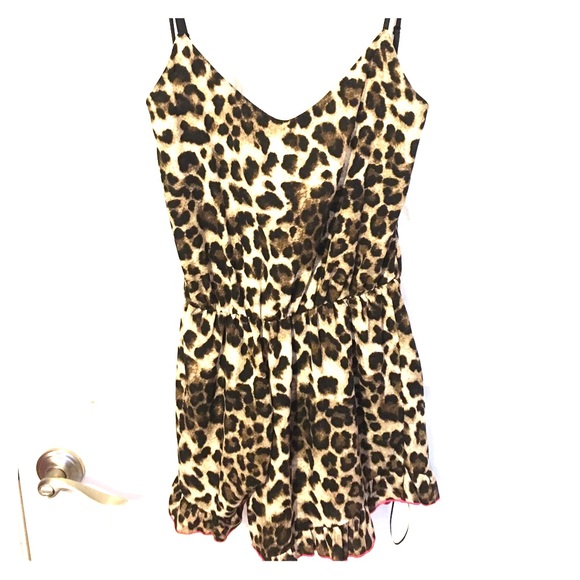 DAINTY HOOLIGAN boutique cheetah romper.