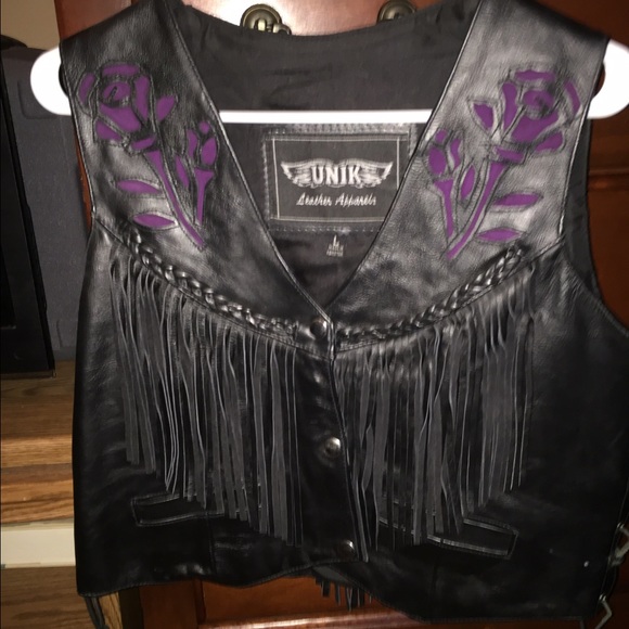 Leather fringed vest with magenta flower details