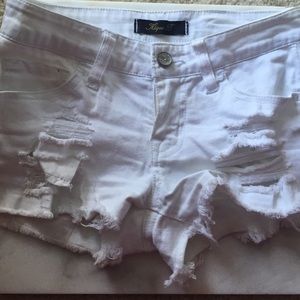 White ripped denim shorts