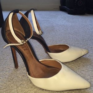 Black and white Schutz pumps - well loved