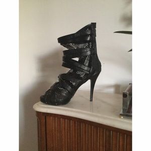 5$$$$ shoes. Black high heel boots. Never worn