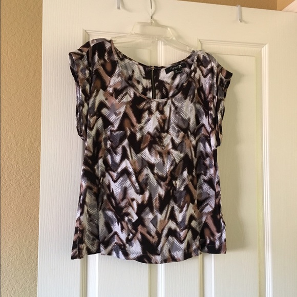 Brown black and cream patterned shirt