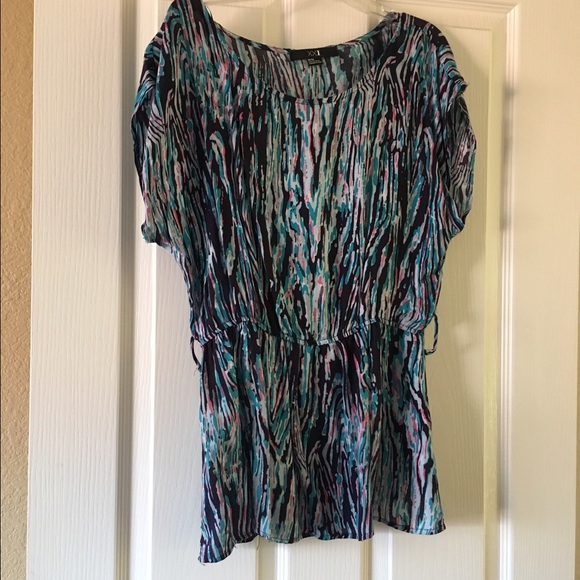 Turquoise pink white and black pattern shirt