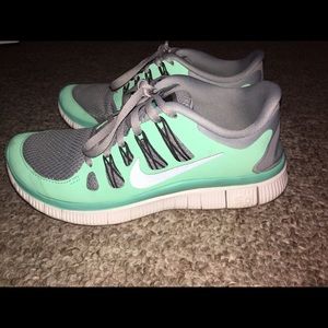 Green/teal Nike free runs