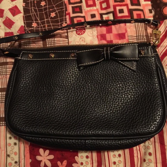 Small black handbag.