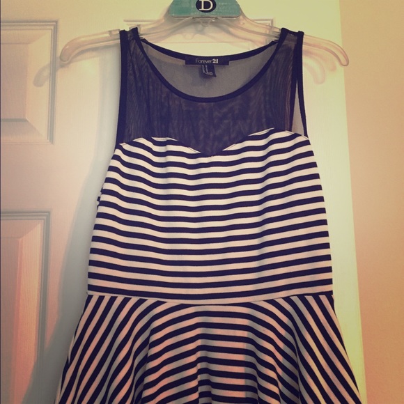 Black and white striped peplum top
