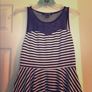 Black and white striped peplum top