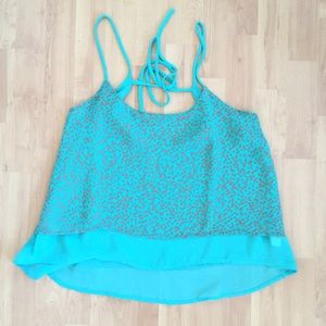 Flowy spaghetti strap top with tie in back