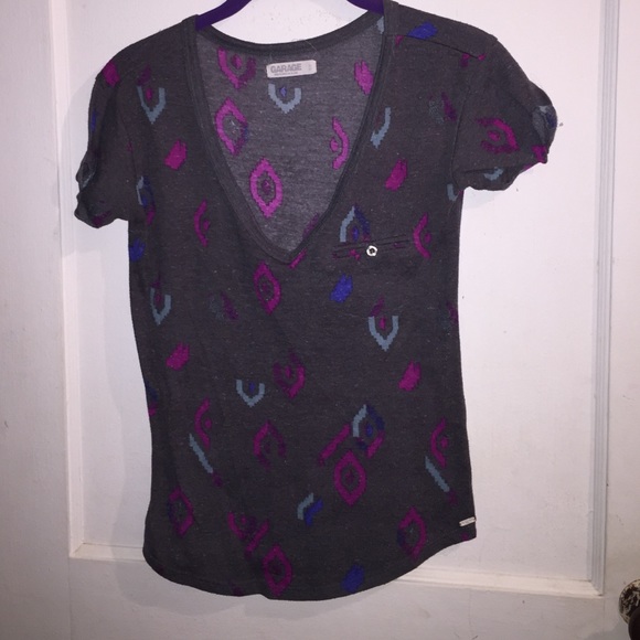 Garage Tops - Very cute Graphic top. Purchased at Garage