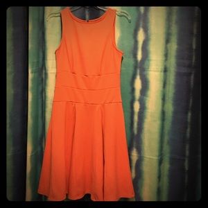 Melon colored sleeveless dress