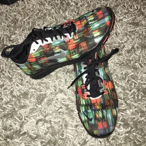 Women's Size 9 multicolored Nike Sneakers.
