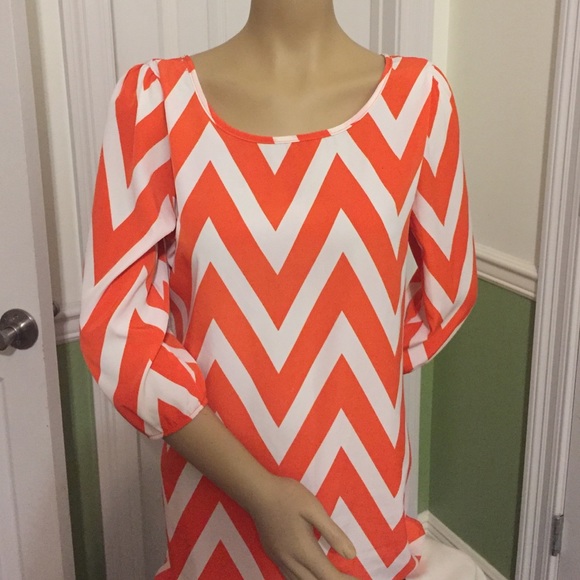 A Papermoon Orange and white chevron dress