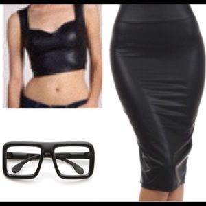 Faux leather skirt, crop top and chic glasses