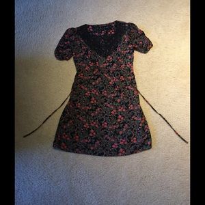 Floral dress with crochet neckline.