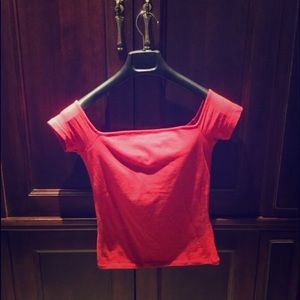 Red off-shoulder top.