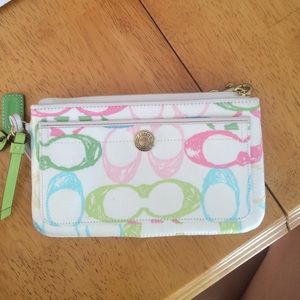 Authentic multi color Coach wristlet.
