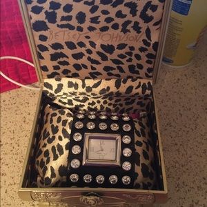 Betsy Johnson. Black leather studded watch .