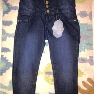 Attractive high-waist blue jeans.