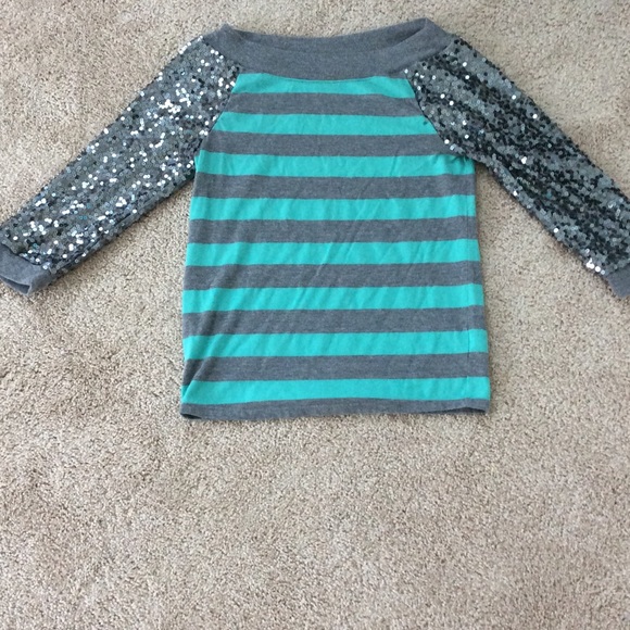 Turquoise and grey striped top