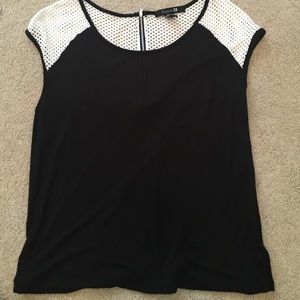 Black short sleeve shirt with white netting