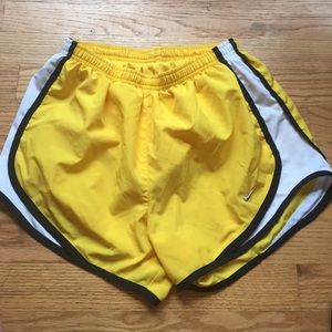 Yellow Nike tempo running shorts