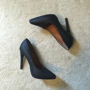 Black pointy toe pumps