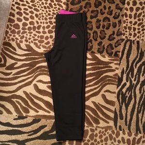 Black Adidas softball pants.