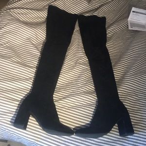 Black of the knee boots