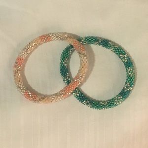 Pink and teal lilly and Laura bracelets