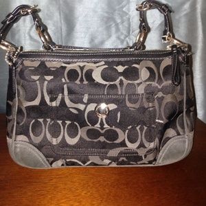 Black and gray Coach purse