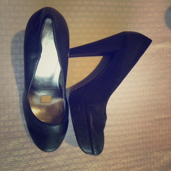 Black Calvin Klein pumps