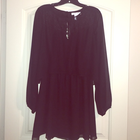 Black open back BCBGeneration dress.