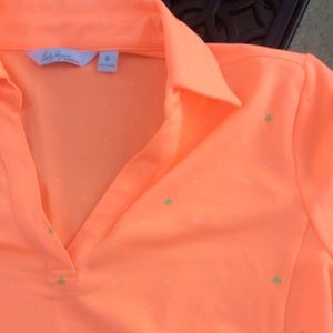 NWOT Lady Hagen Orange Polo w/ White & Green