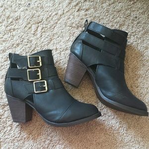 Black booties with buckles