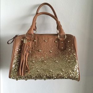 Brown and gold purse