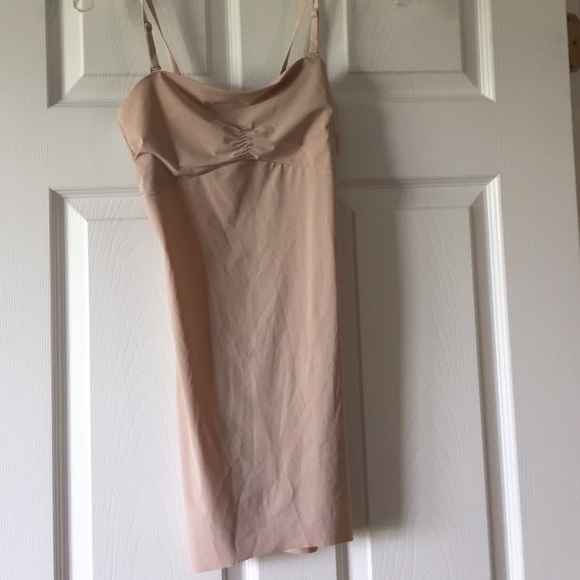 Nude slip for under a dress.