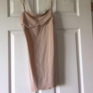 Nude slip for under a dress.