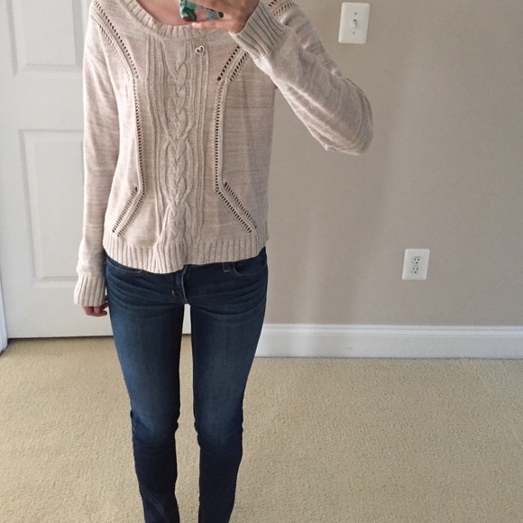 Cable knit sweater.