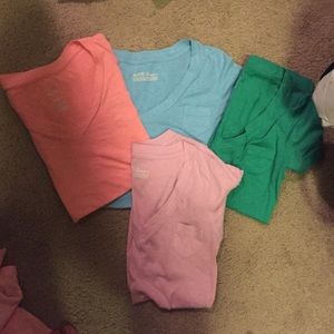 Lot of 4 boyfriend style v neck pocket t's